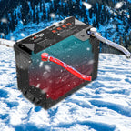Black Voltgo lithium battery on a snowy background connected to red and gray cables, illustrating use in cold-weather conditions.
