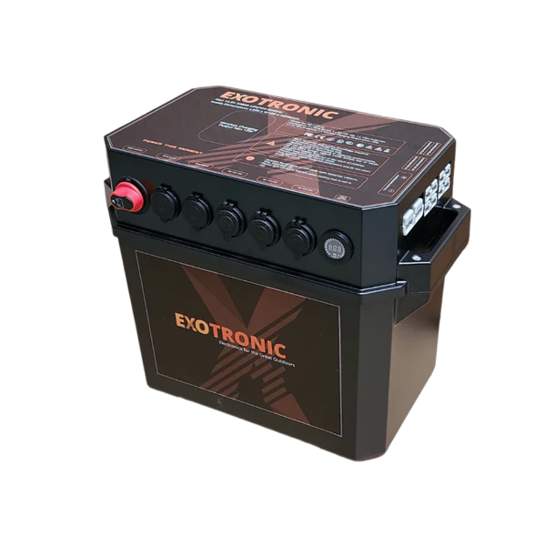 A black Exotronic Qi-Enabled Heavy-Duty Battery Box with a digital voltage display, multiple switches, and a removable button.