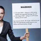 Person holding a warning sign 12V Input Only